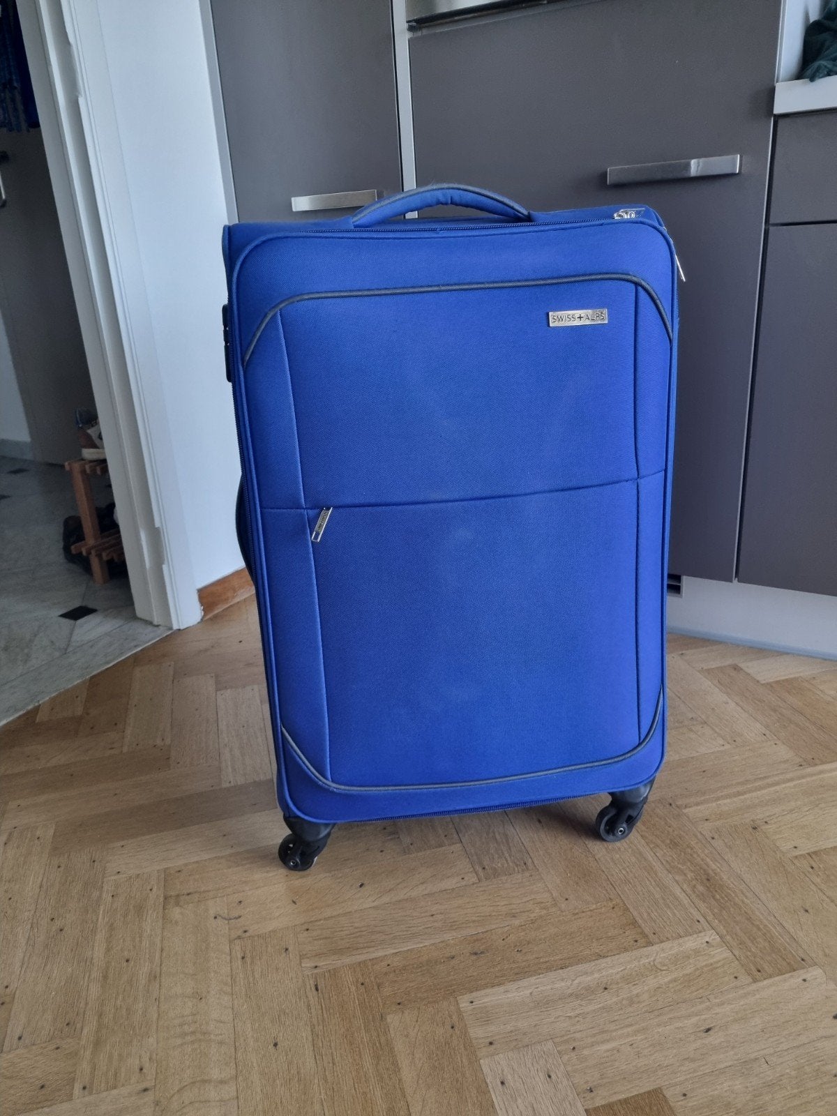 grote blauwe koffer, Ophalen