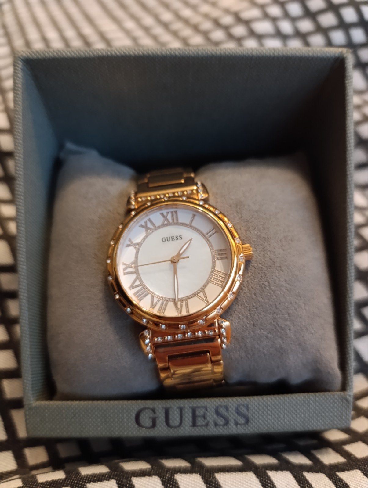 Guess dameshorloge, Ophalen, Guess