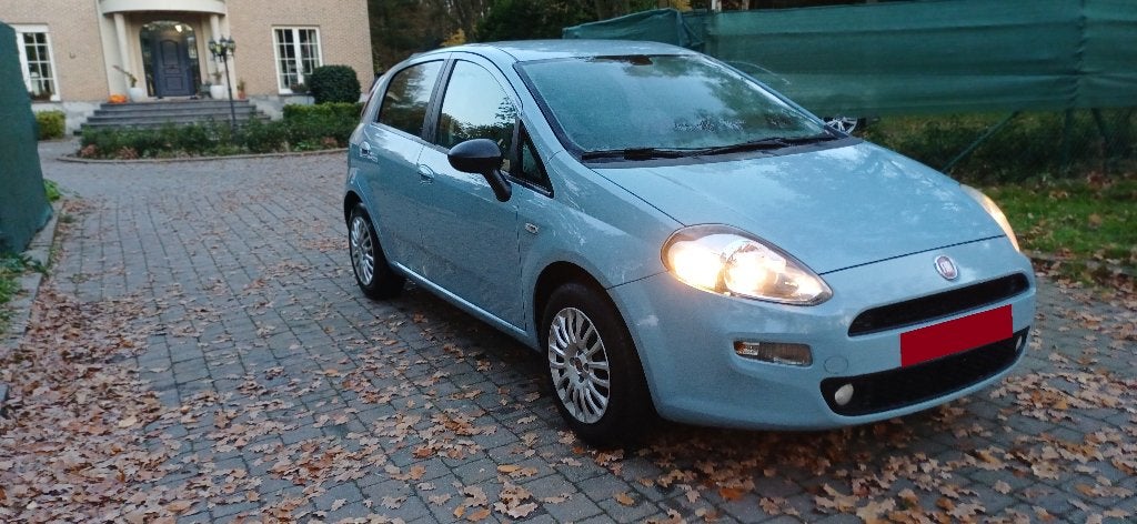 Fiat Punto 1.2i BJ05/2015 88670km NAV. N.RIEM.1jaar Garantie, Auto's, Fiat, Euro 5, Monovolume, 1242 cc, 5 deurs