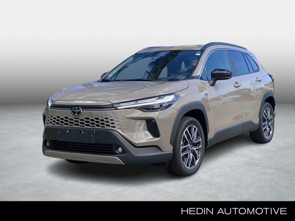 Toyota Corolla Cross 1.8 Hybrid Style | Achteruitrijcamera |, Auto's, Stof, Gebruikt, 750 kg, 4 cilinders