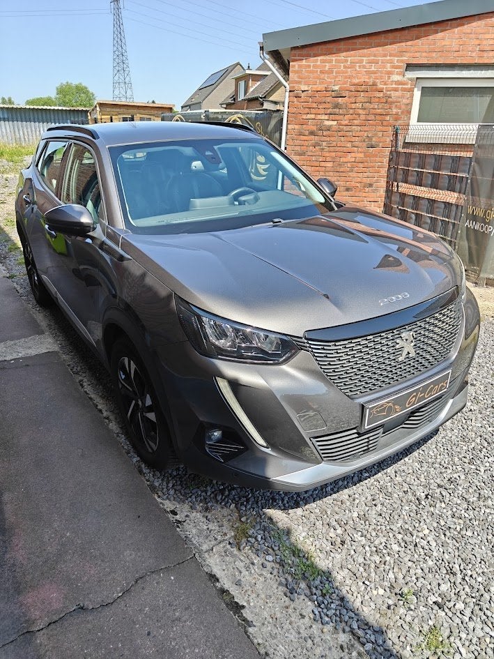 Peugeot 2008 Allure (bj 2020), Auto's, Voorwielaandrijving, Stof, Gebruikt, Euro 6