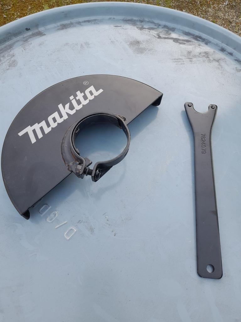 Makita slijpmachiene beschermkap, Enlèvement