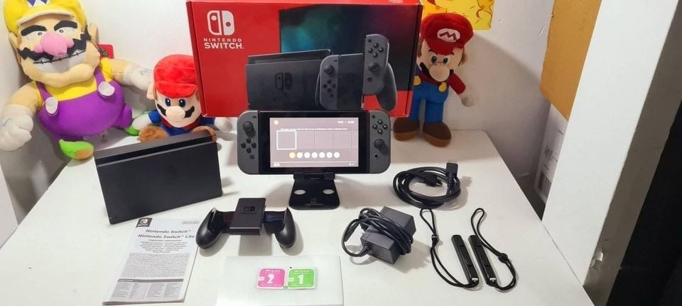 console nintendo switch grise ( v2) complete + garantie, Enlèvement ou Envoi, Comme neuf