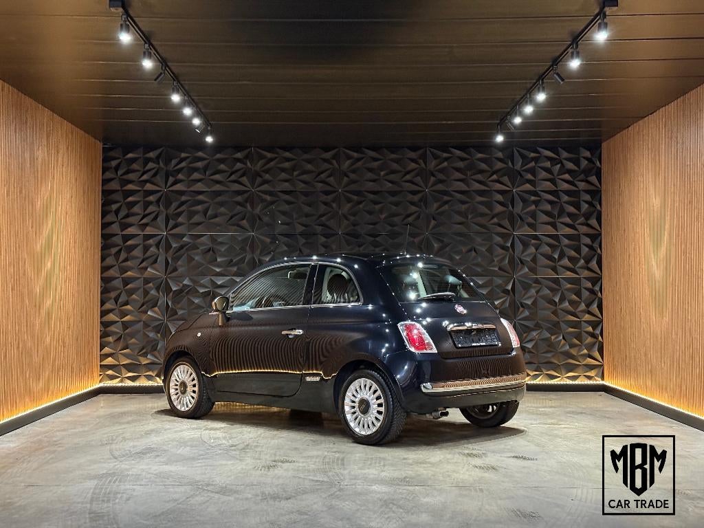 ✅ Fiat 500 1.2i Lounge GARANTIE Airco Pano Navi Parksensor, Voorwielaandrijving, 4 zetels, Stof, Zwart