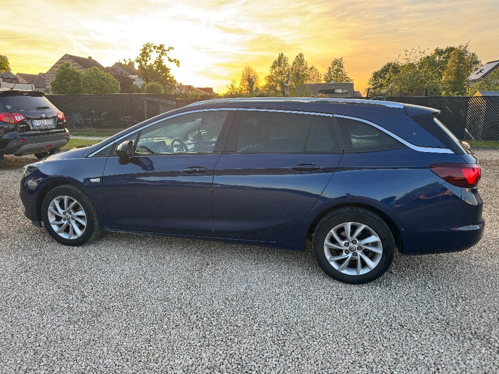 Opel Astra Sports Tourer 2021 • 1.5D Euro 6d • Camera, Auto's, Voorwielaandrijving, Euro 6, Blauw, Alcantara