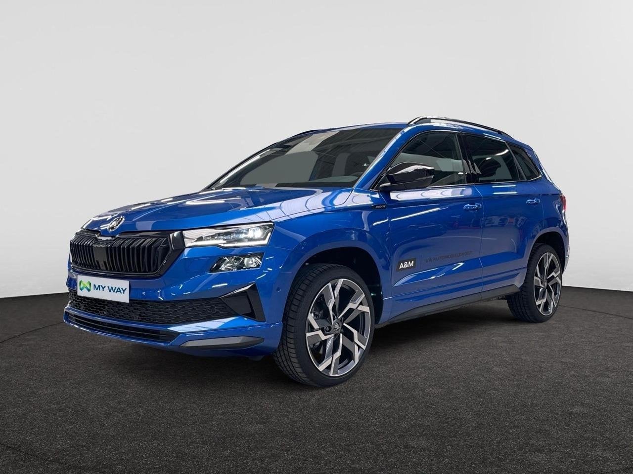 Skoda Karoq SPORTLINE 1.5 TSI 150 PK DSG AUTOMAAT, Auto's, Start-stop-systeem, Blauw, SUV of Terreinwagen, 144 g/km