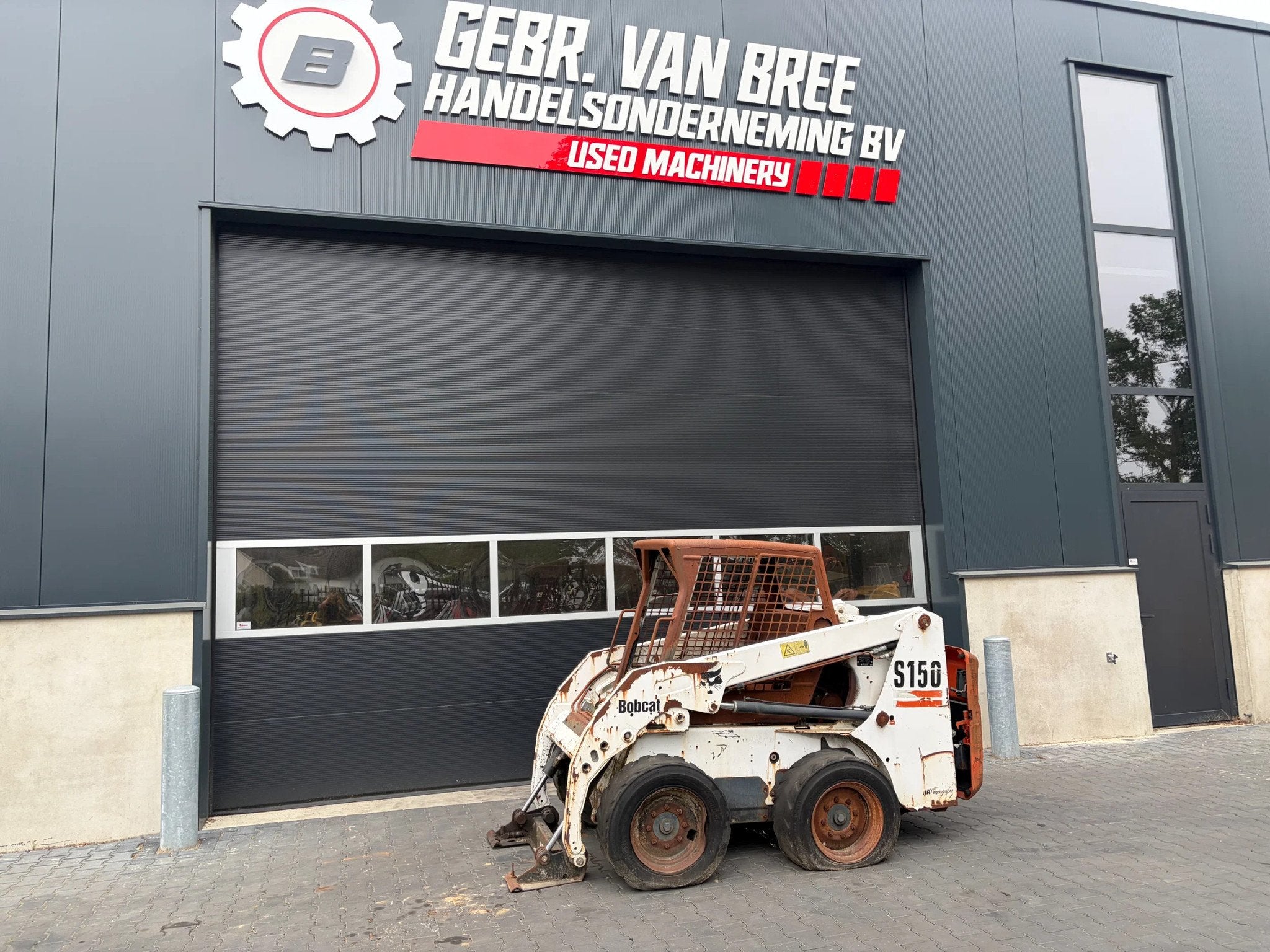 Bobcat S150 schranklader (année de construction 2003), Chargeuse sur pneus ou Chouleur
