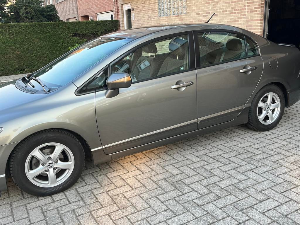 Honda Civic Hybride 1,3 IMA 90 Zuinig, Auto's, 4 deurs, 4 cilinders, Grijs, Euro 4