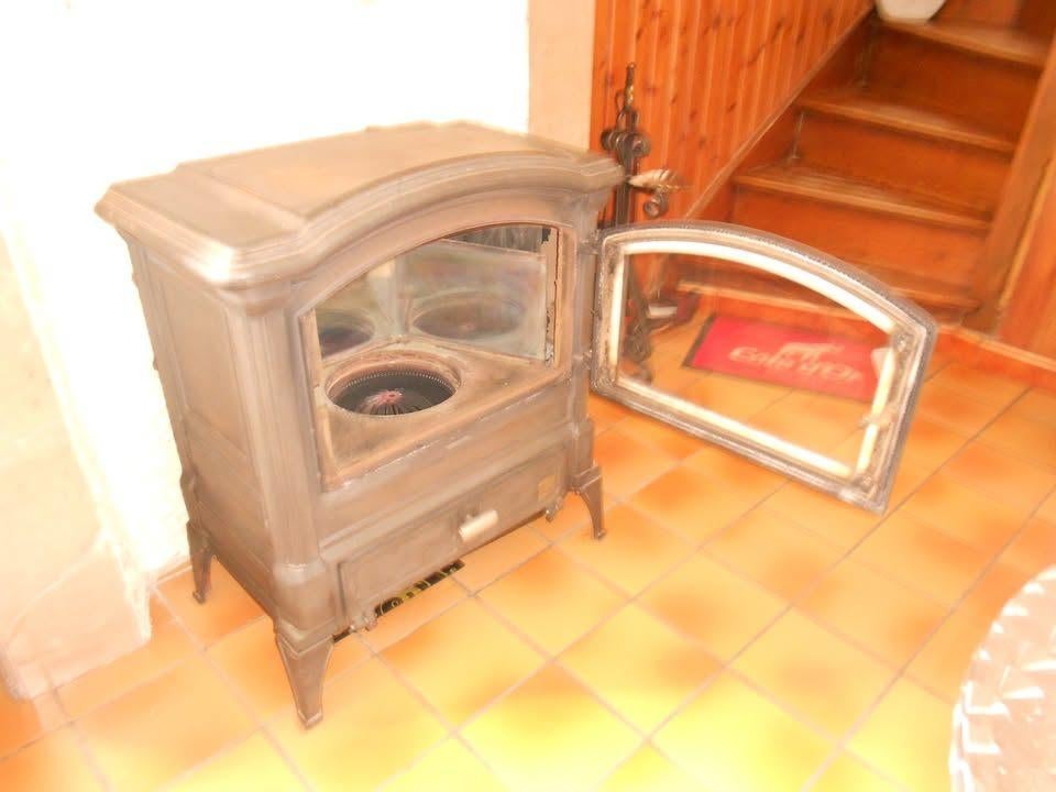poele en fonte a mazout, Maison & Meubles, Poêles, Utilisé, Autoportant, Autres types, Enlèvement