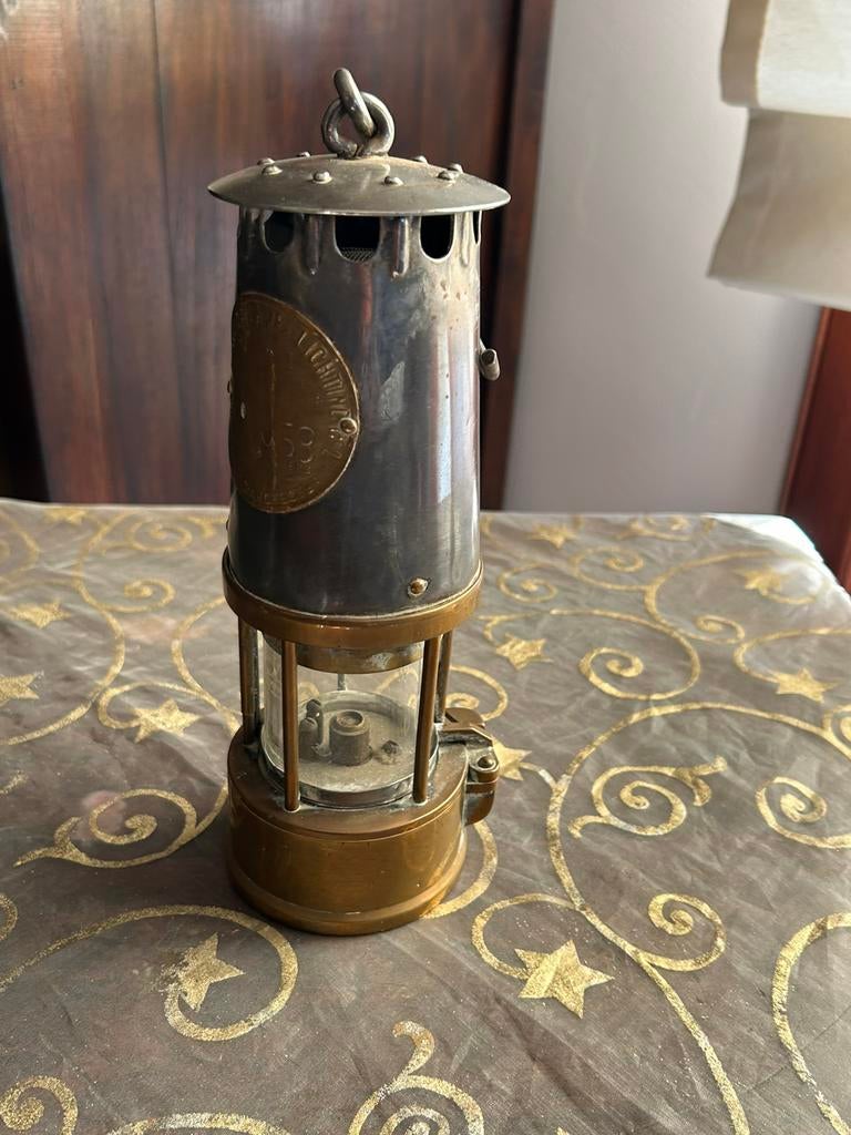 Mijnwerkerslamp, Ophalen