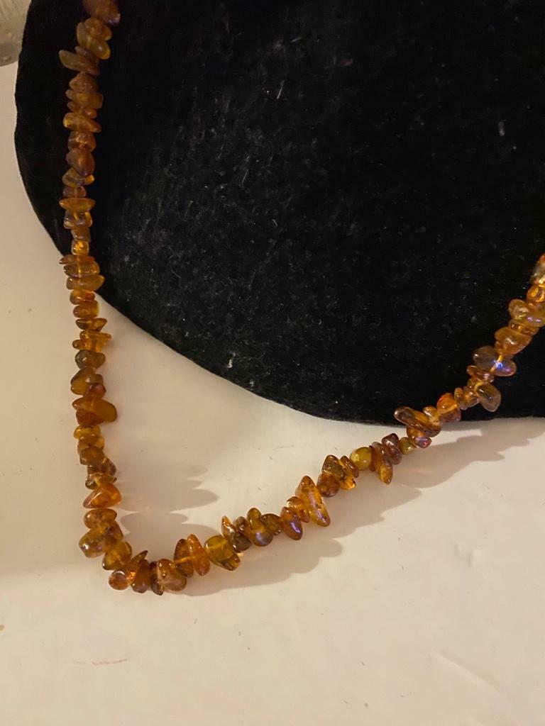 Collier en ambre, Enlèvement, Neuf