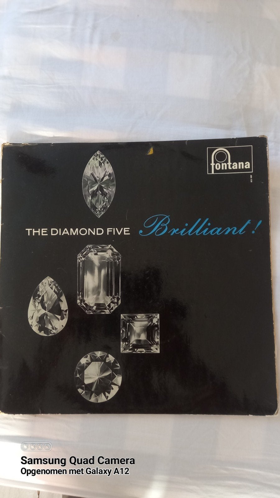 een vinyl plat,, Enlèvement