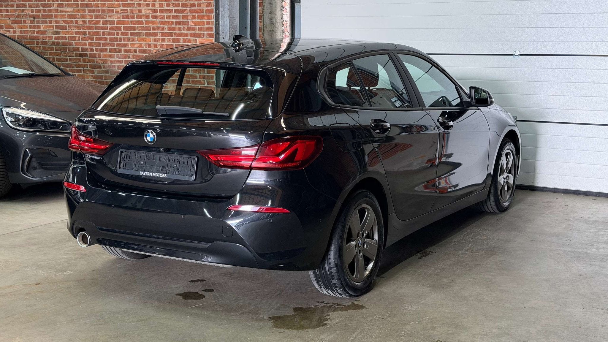 BMW 116 iA Automaat Garantie Benzine EURO 6d, Automaat, Gebruikt, Zwart, Bedrijf
