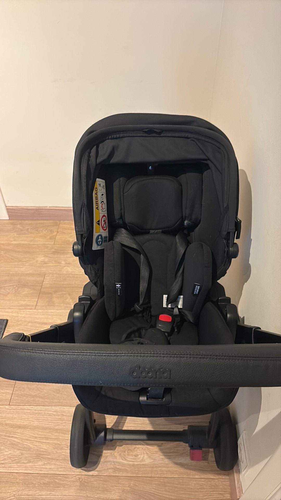 À vendre : Siège auto et poussette Doona X — noir, Enlèvement ou Envoi, Comme neuf, Poussette