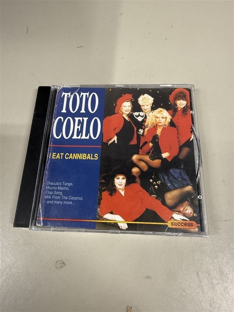 Toto Coelo - I Eat Cannibals, CD & DVD, CD | Autres CD, Enlèvement ou Envoi, Comme neuf