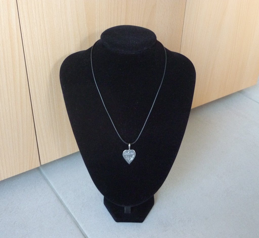 Zwarte touw ketting met zilverkleurige hart Alice hanger, Ophalen of Verzenden
