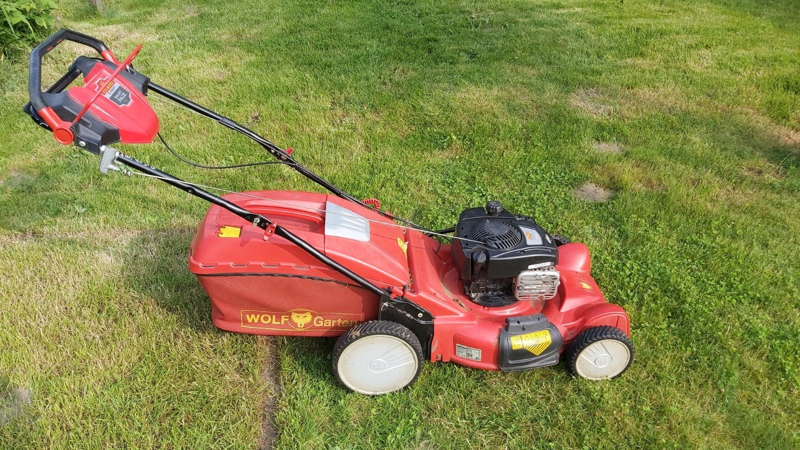 ZELFTREKKENDE GRASMAAIER WOLF GARTEN 53CM, Tuin en Terras, Grasmaaiers, Opvangbak, Ophalen