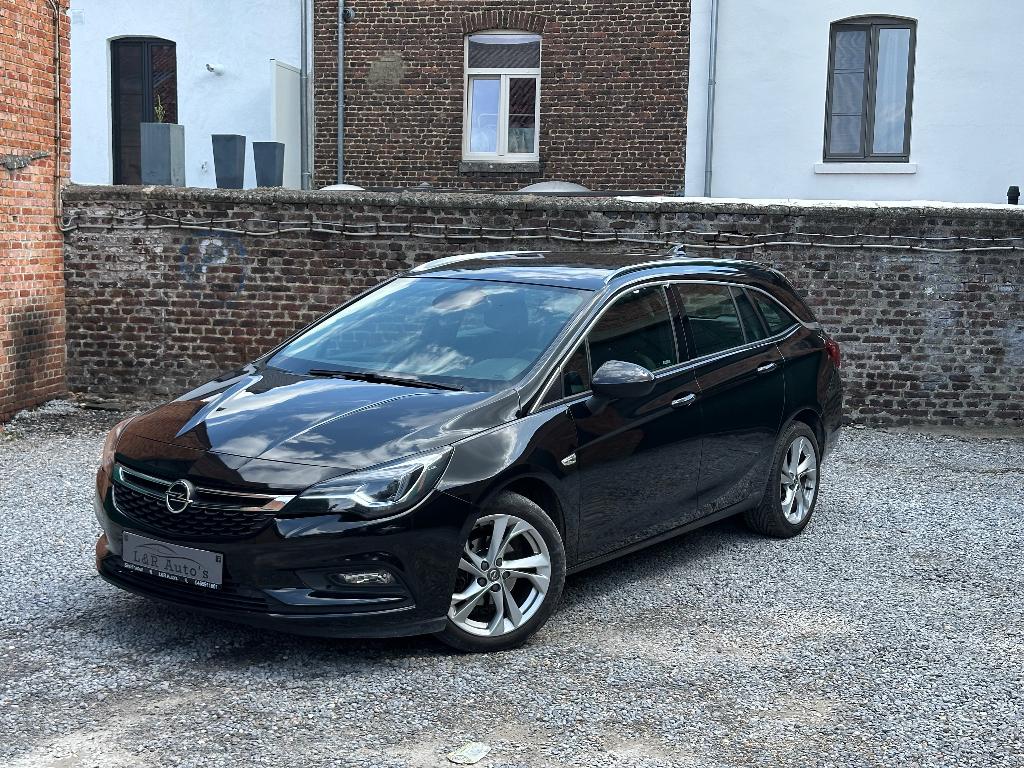 Opel Astra Sports Tourer benzine 1,4 cc automaat, Auto's, Automaat, 4 cilinders, Parkeerassistent, Leder en Stof