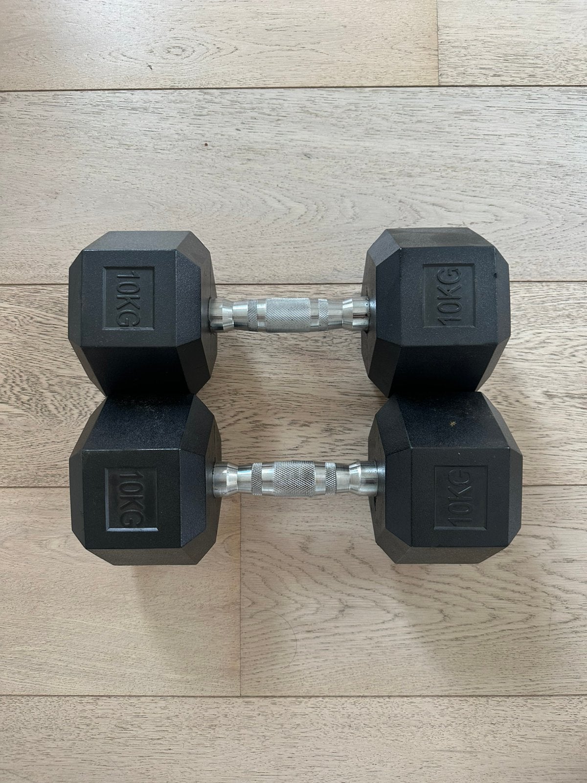 Hexagon 10kg dumbells, Sport en Fitness, Fitnessmaterialen, Ophalen, Zo goed als nieuw