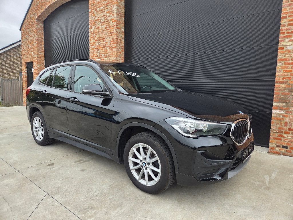 BMW X1 Sdrive 16DA ADVANTAGE BUSINESS   / GARANTIE, Auto's, Dealer onderhouden, 109 g/km, Zwart, Leder