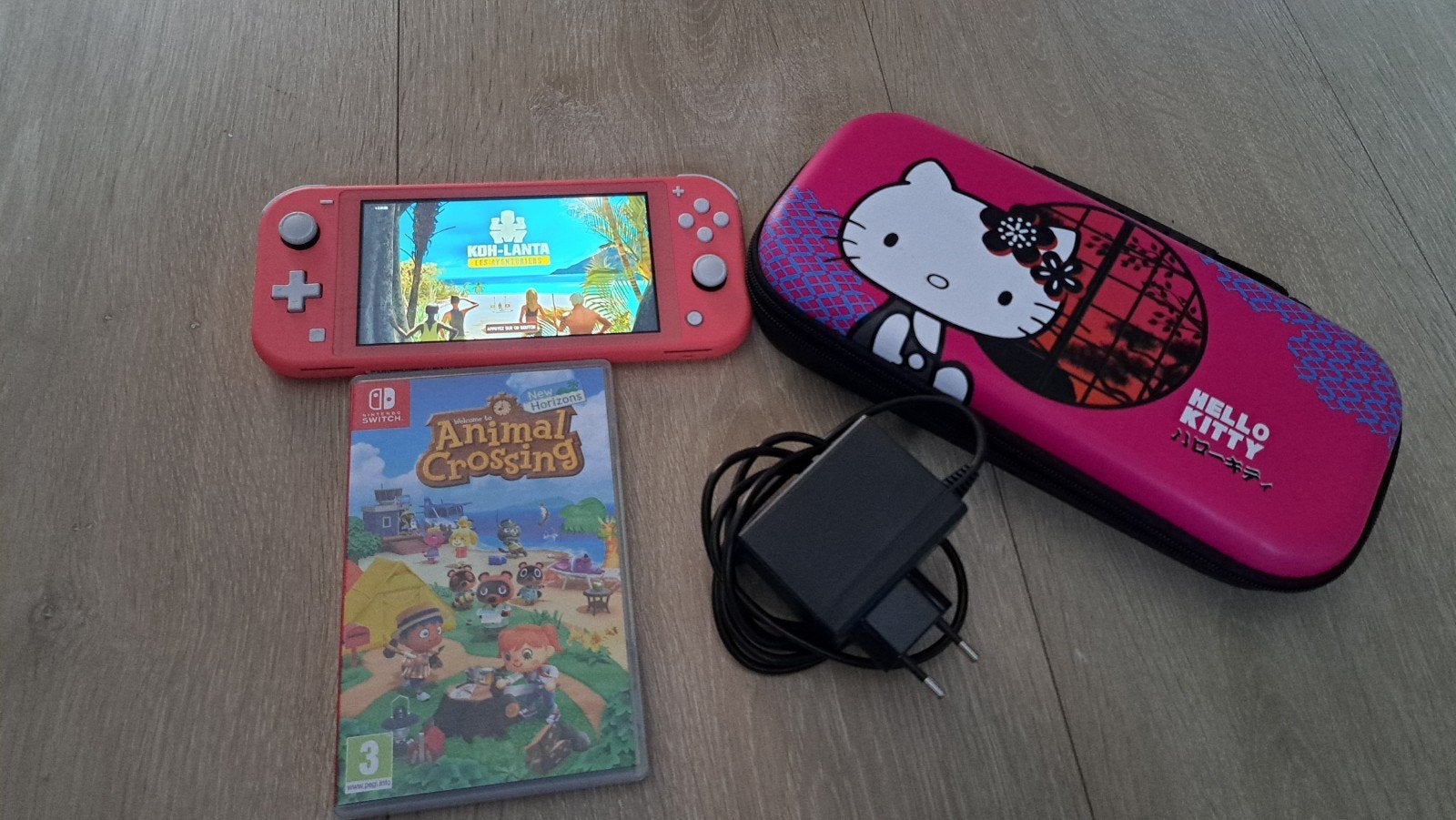 Nintendo Switch Portable Lite: zo goed als nieuw, 2 Game Cha, Games en Spelcomputers, Spelcomputers | Nintendo Switch Lite, Zo goed als nieuw