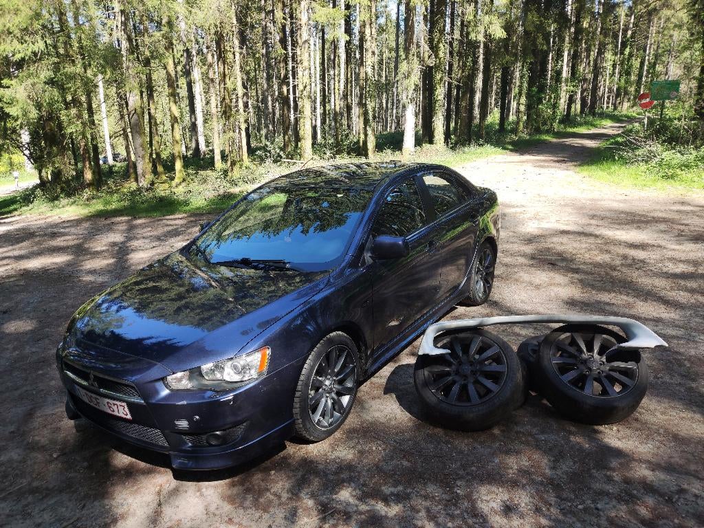 Mitsubishi Lancer, Auto's, Voorwielaandrijving, Zwart, 4 cilinders, Blauw