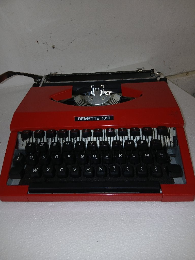 Machine à écrire, Ophalen, Zo goed als nieuw