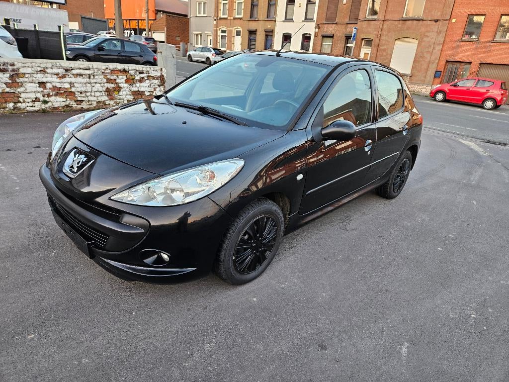 Peugeot 206+ 1.4hdi 2011euro5 clim tb.état roule impeccable, Auto's, Stof, 50 kW, Zwart, 99 g/km