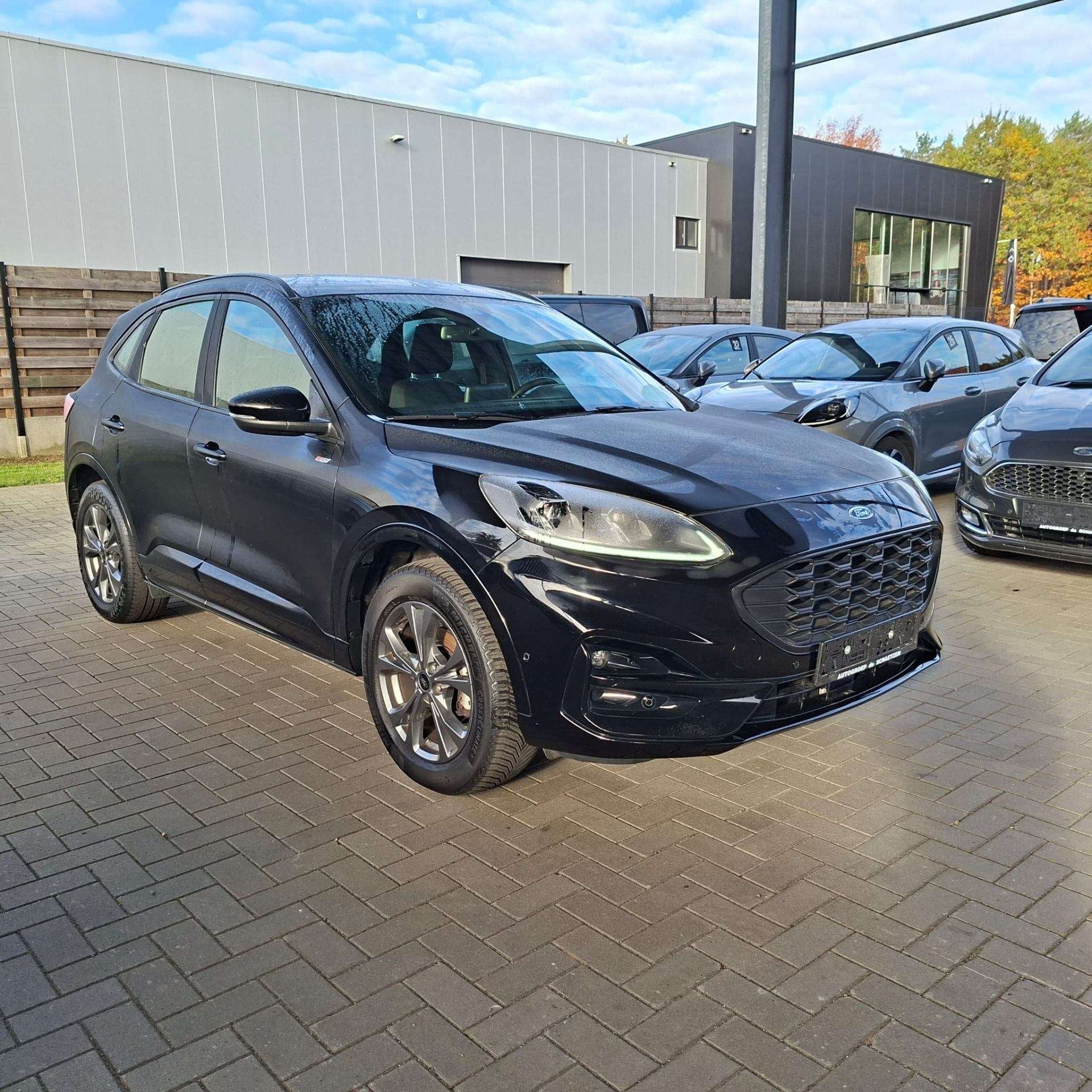 Ford Kuga St - Line PHEV / Winterpack / Head up Display, Auto's, Automaat, Stof, Gebruikt, Zwart