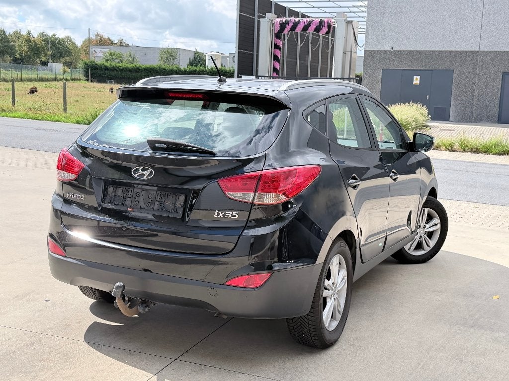 | Hyundai Ix35 | Trekhaak | Airco | 1.7 diesel |, Auto's, Hyundai, Voorwielaandrijving, Euro 5, Zwart, Leder en Stof