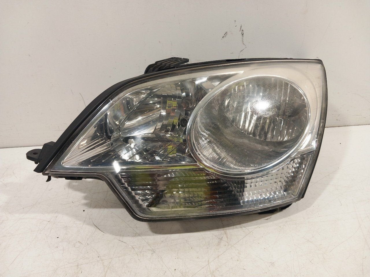 Koplamp links Opel Antara, Auto-onderdelen, Verlichting, Onderdelen@venauto.nl, Van der Ven Autorecycling B.V., Gebruikt, Ettenseweg 76, 4706 PB Roosendaal, The Netherlands