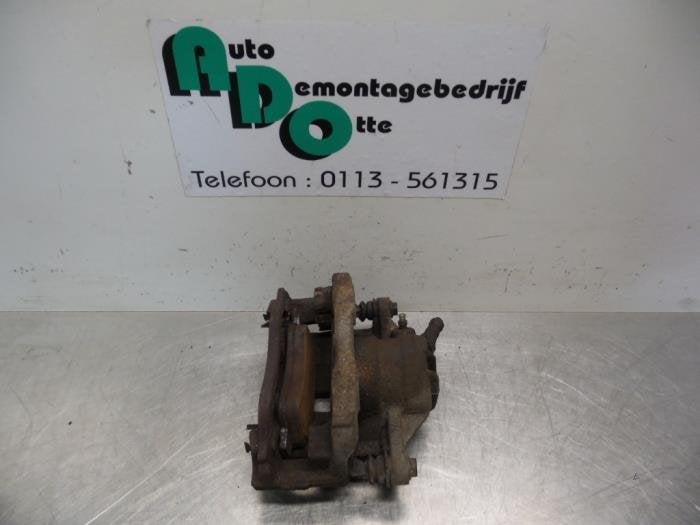 Etrier de frein (pince) avant gauche d'un Peugeot 206, -, 3 mois de garantie, Utilisé, -
