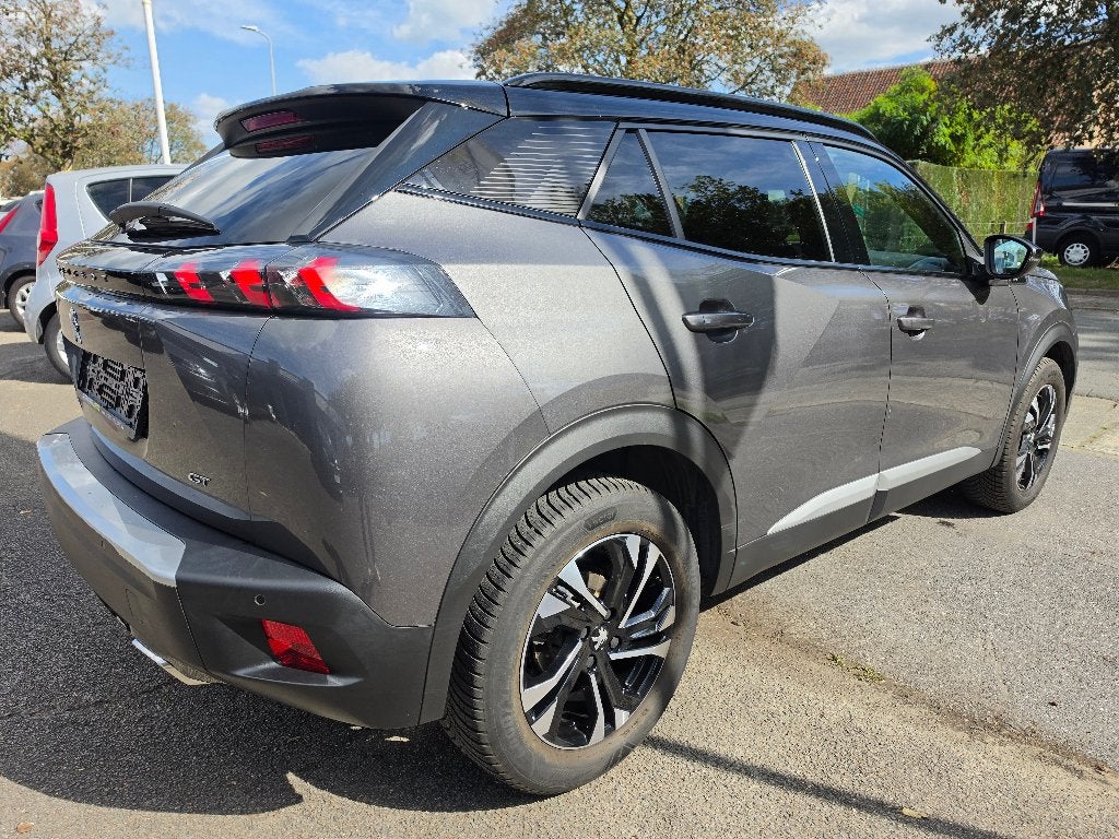 Peugeot 2008 GT, 1.2i, 2023, 55.280Km, Automaat, 1j Garantie, Auto's, Euro 6, 1199 cc, Leder en Stof, 5 zetels