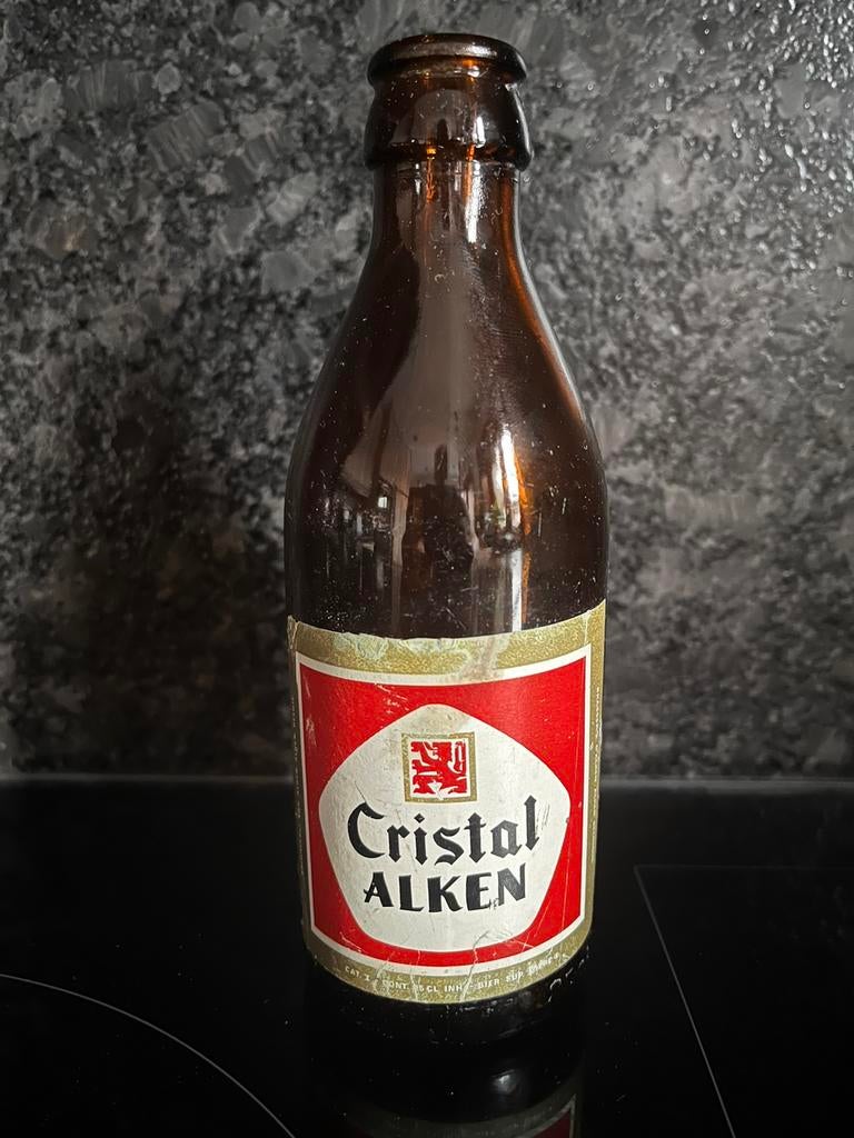 Oud bierflesje Cristal Alken van de jaren 1970, Collections, Marques de bière, Enlèvement ou Envoi, Comme neuf, Leeuw