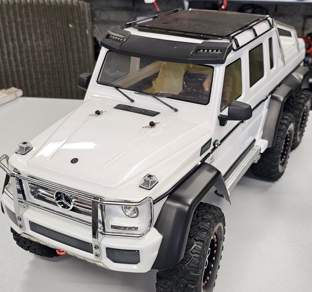 Traxxas TRX-6 G63 AMG 6x6 met upgrades, Hobby en Vrije tijd, Modelbouw | Radiografisch | Auto's, Elektro, Auto offroad, Ophalen of Verzenden