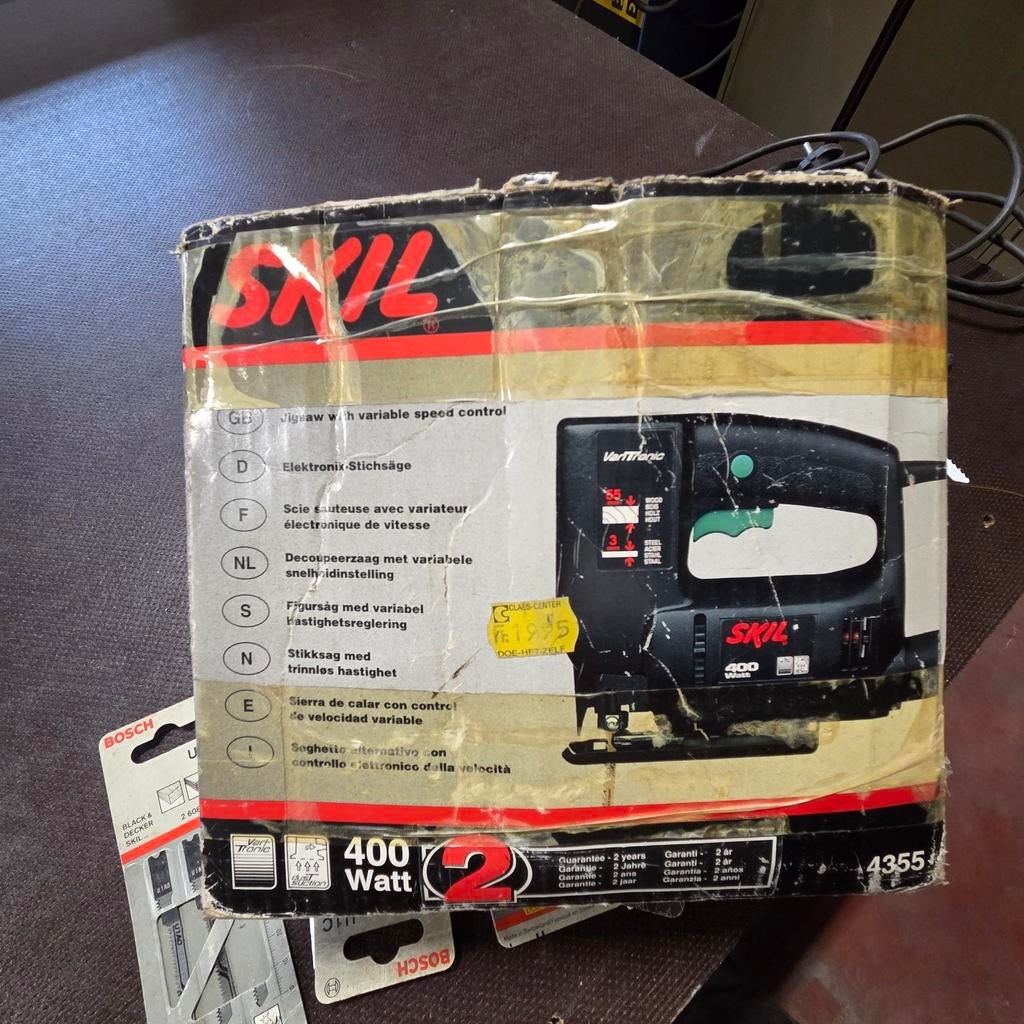 Decoupeerzaag Skill 400 W, Ophalen