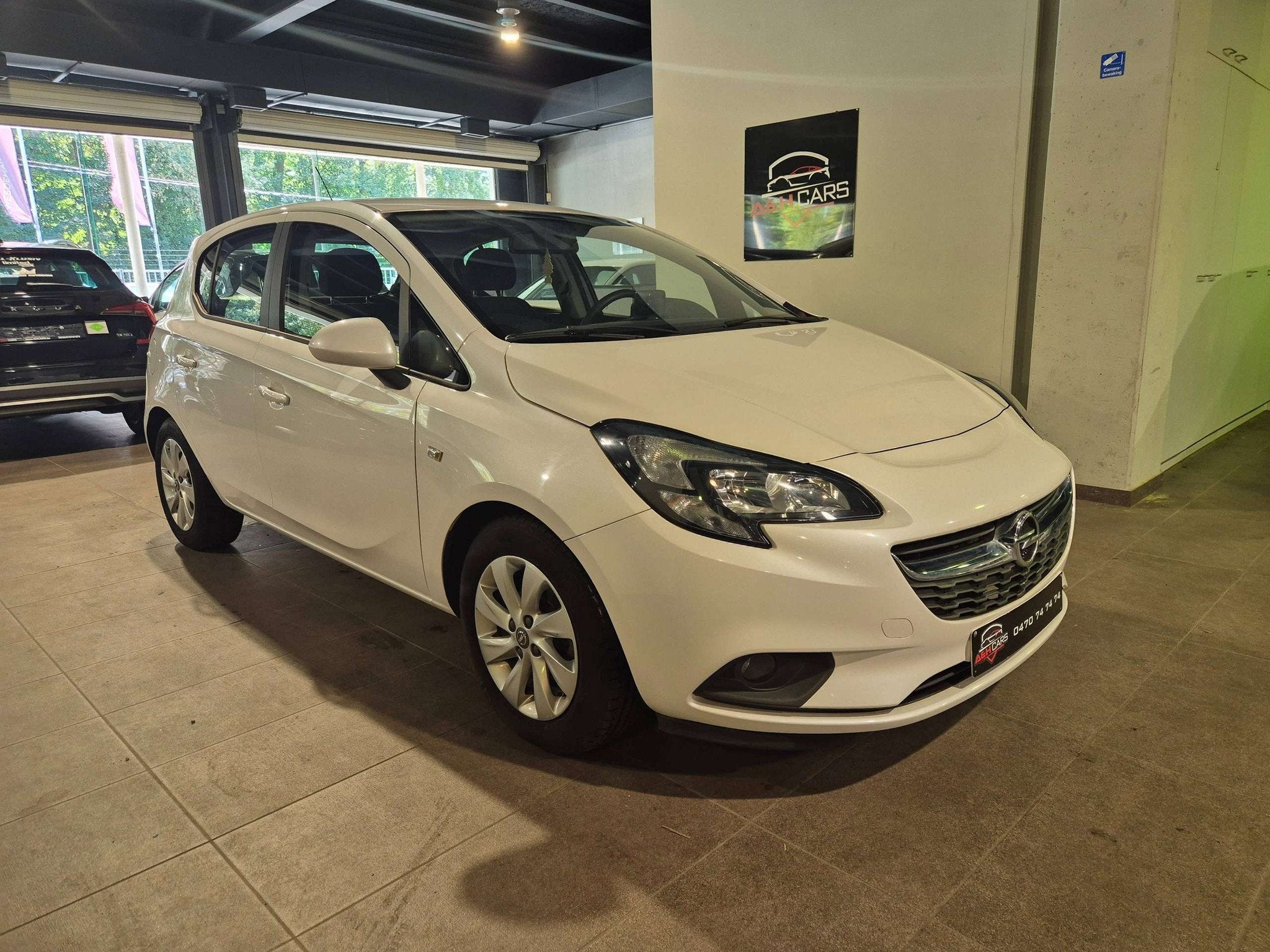 Opel Corsa Corsa 1.2i Enjoy (bj 2017), Auto's, Voorwielaandrijving, Stof, Gebruikt, 4 cilinders