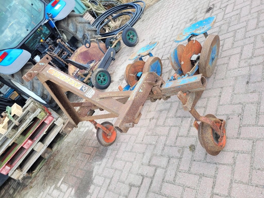 2 rij accord plantmachine, Ophalen