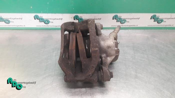 Etrier de frein (pince) avant gauche d'un Peugeot 206, -, 3 mois de garantie, Utilisé, -