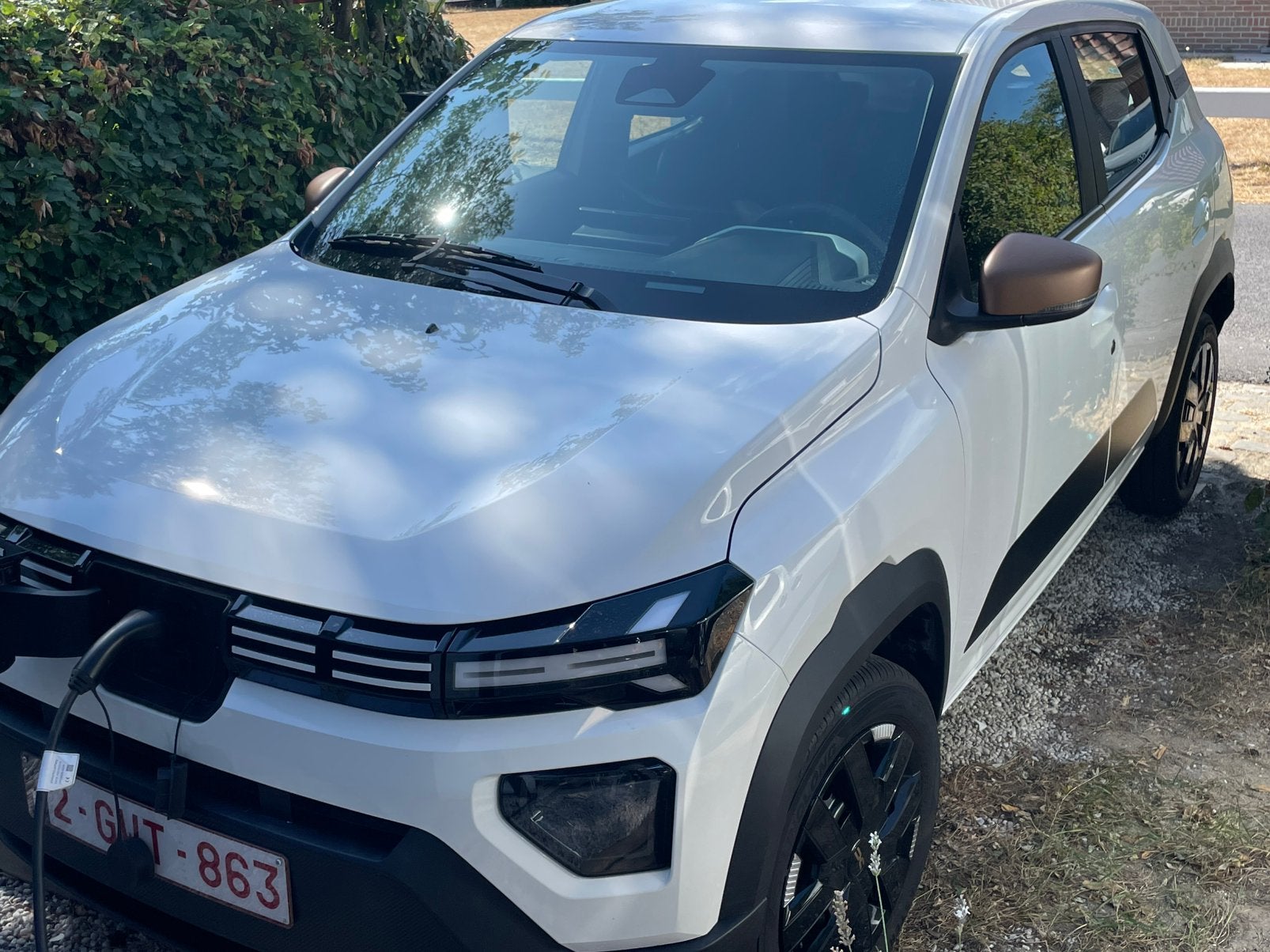 Dacia spring in nieuwstaat, Auto's, Stof, Zwart, Wit, Elektrisch
