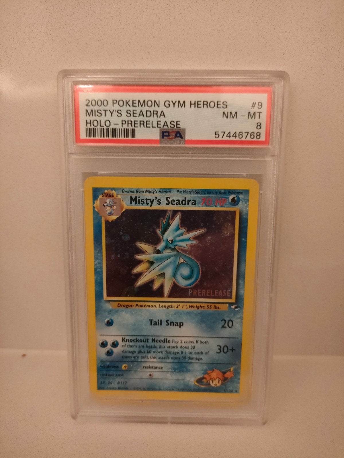 PSA 8 Misty’s Seadra Holo Prerelease (2000 Gym Heroes) #9, Hobby en Vrije tijd, Verzamelkaartspellen | Pokémon, Ophalen of Verzenden