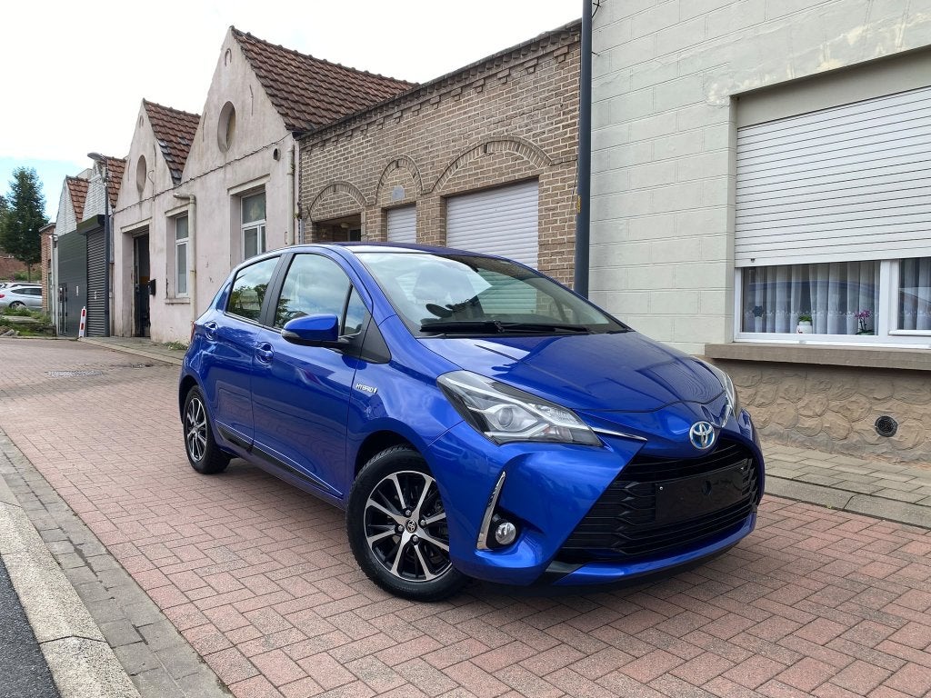 Toyota Yaris 1.5L Benzine + Hybrid / 2018 /73000.km/Garantie, Dealer onderhouden, 4 cilinders, Blauw, Adaptive Cruise Control