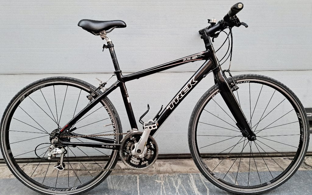 VTC TREK7.5 FX 28" DEORE LX état nickel 340€048981/3734, Vélos & Vélomoteurs, Autres marques, Vitesses, Frein sur jante, Comme neuf