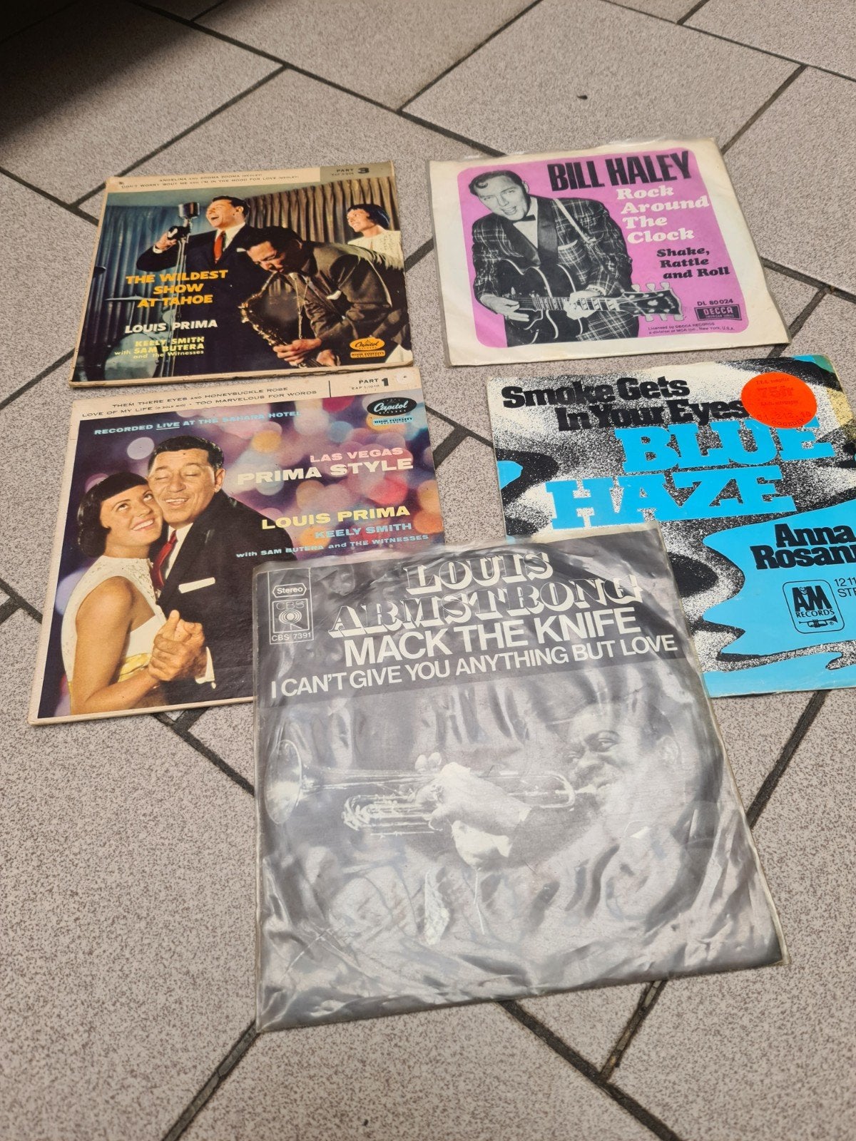 lot singels, Cd's en Dvd's, Ophalen