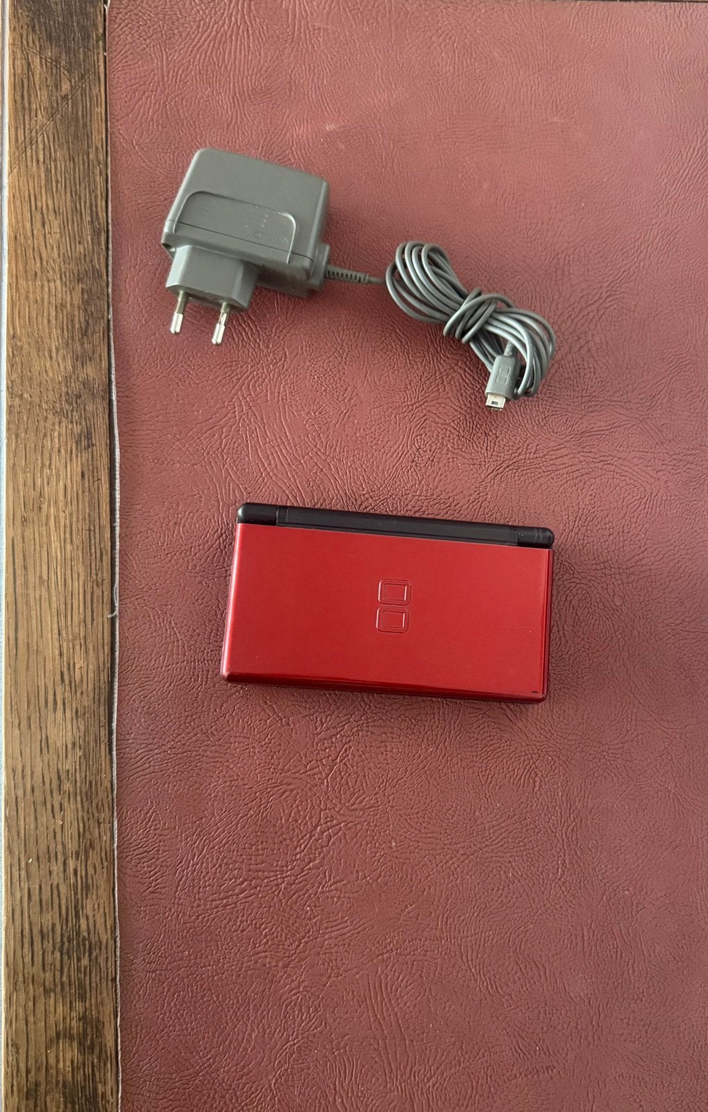 Nintendo DS lite koperrood, Games en Spelcomputers, Spelcomputers | Nintendo DS, Ophalen of Verzenden, Zo goed als nieuw, Rood