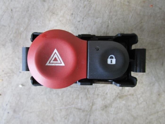 Commutateur éclairage d'urgence d'un Renault Clio (Clio 3 0, Renault, -, 3 mois de garantie, Utilisé