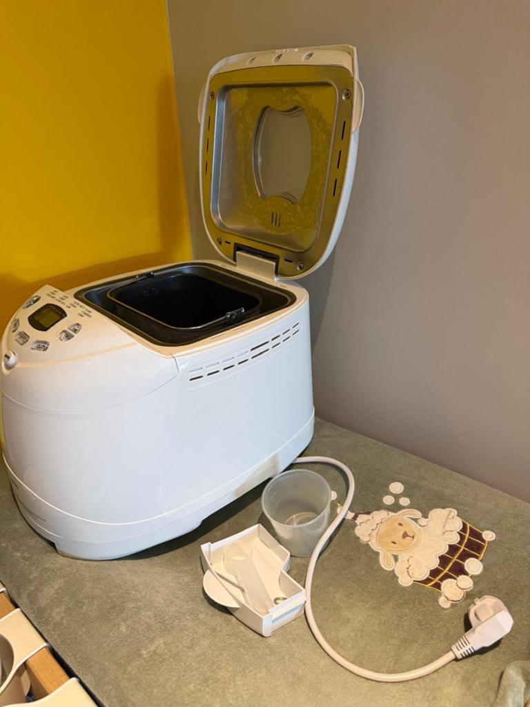 Automatische broodbakmachine, Ophalen