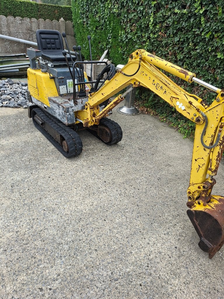 Excavatrice Komatsu, Enlèvement, Excavatrice