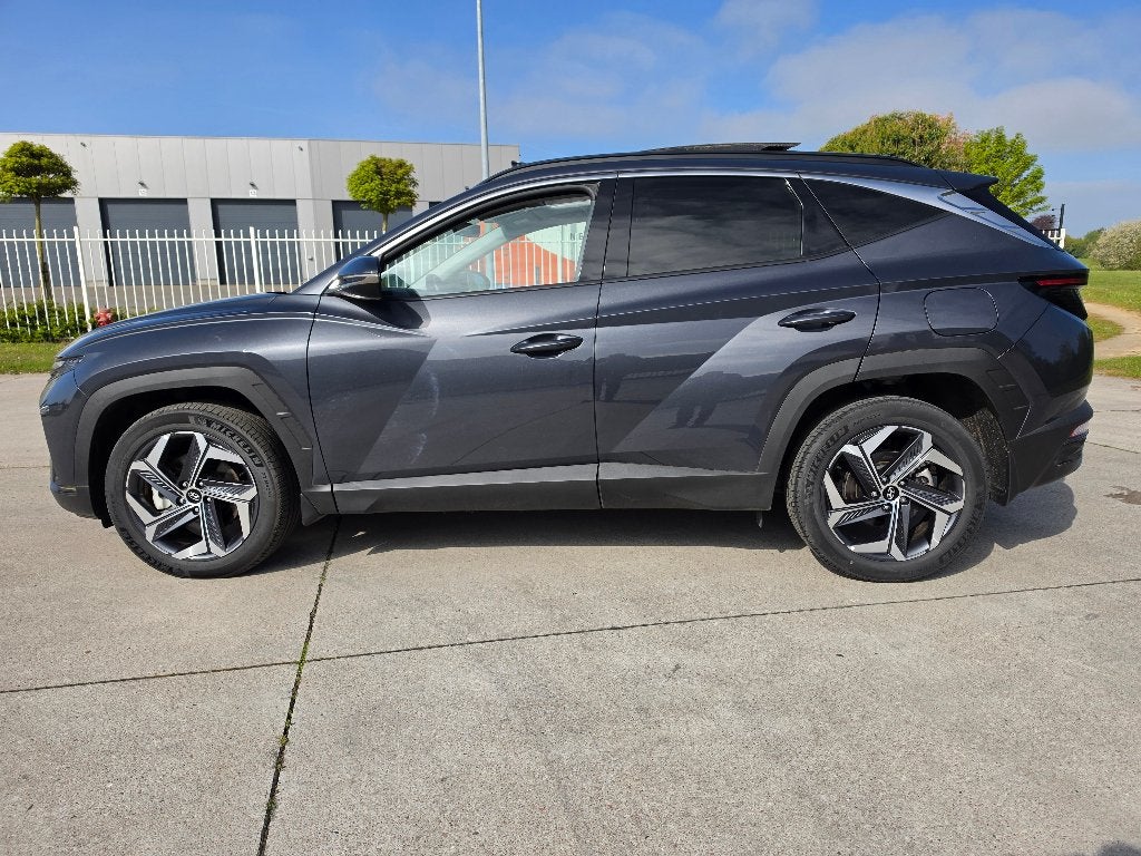 Hyundai Tucson 1.6 T-GDI Hybride Pano Full Option + Garantie, Auto's, Automaat, Leder, Bedrijf, 5 zetels