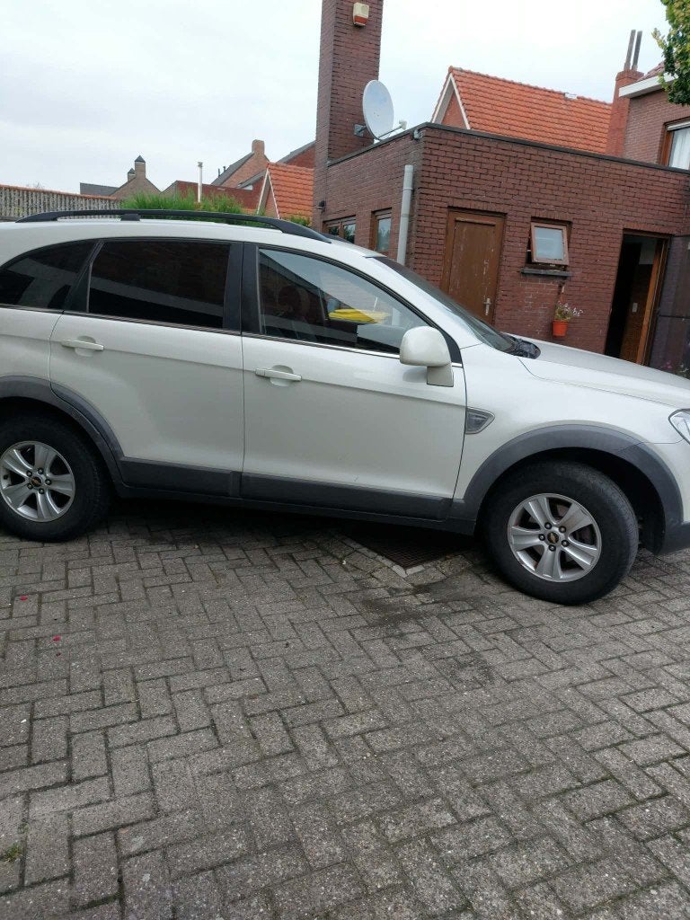 Chervolet captiva in good staat., Auto's, Voorwielaandrijving, Wit, Leder, 5 deurs